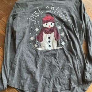 Grey long sleeve Christmas shirt that says Just Chilling in glitter font